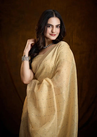 Indo Silk Golden Beige Sarees Crafted With A Blend Of Linen And Silk Offer A Unique Combination Of Texture And Elegance