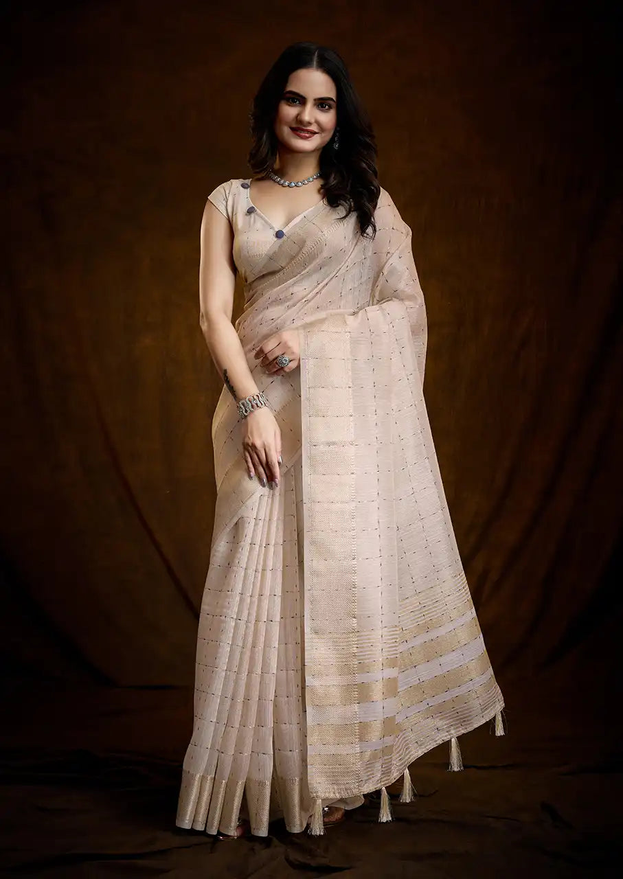 Indo Silk Cream White Sarees Crafted With A Blend Of Linen And Silk Offer A Unique Combination Of Texture And Elegance
