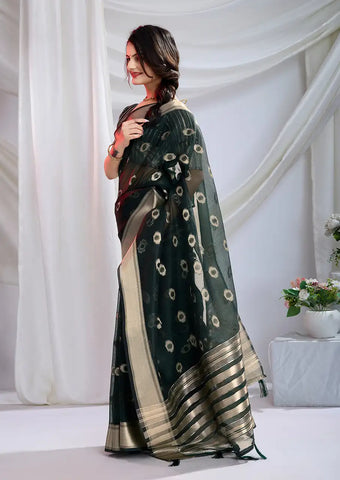 Indo Silk Deep Green Sarees Crafted With A Blend Of Linen And Cotton Offer A Unique Combination Of Texture And Elegance