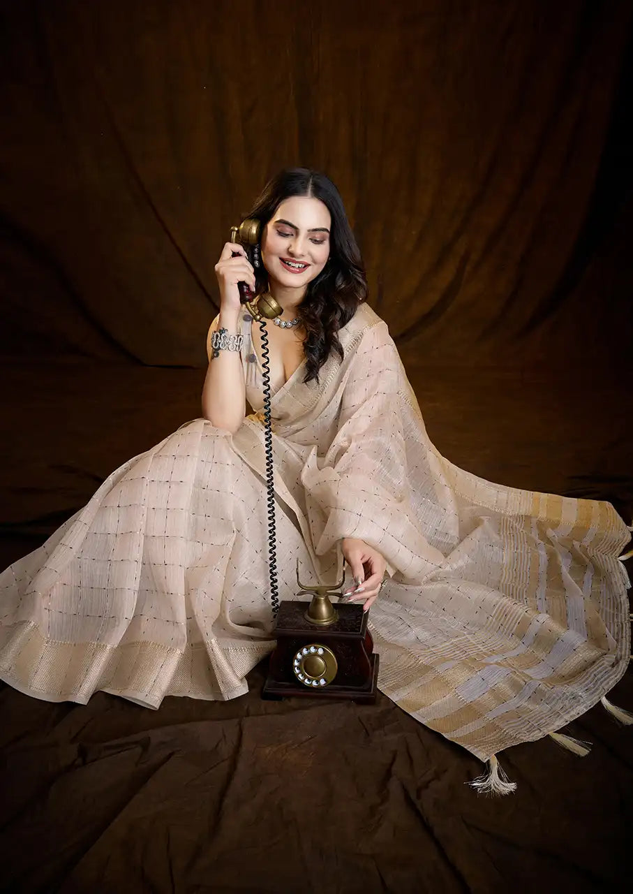 Indo Silk Cream White Sarees Crafted With A Blend Of Linen And Silk Offer A Unique Combination Of Texture And Elegance
