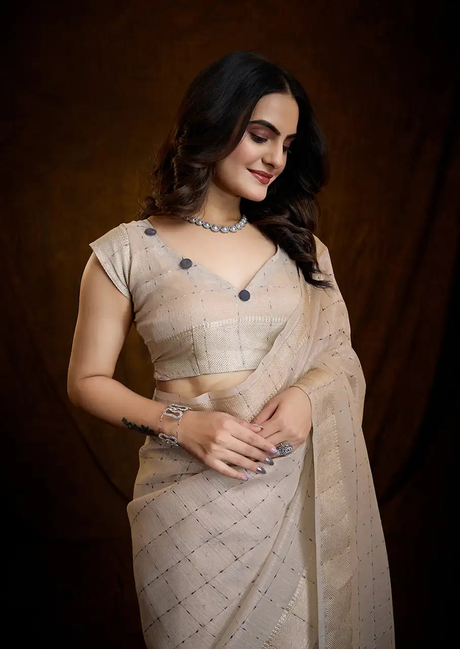 Indo Silk Cream White Sarees Crafted With A Blend Of Linen And Silk Offer A Unique Combination Of Texture And Elegance