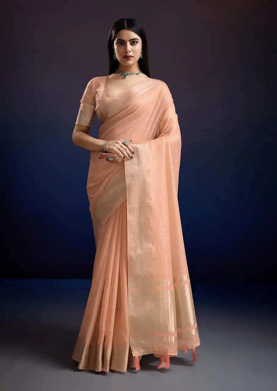 Indo Silk Peach Sarees Crafted With A Blend Of Linen And Cotton Offer A Unique Combination Of Texture And Elegance