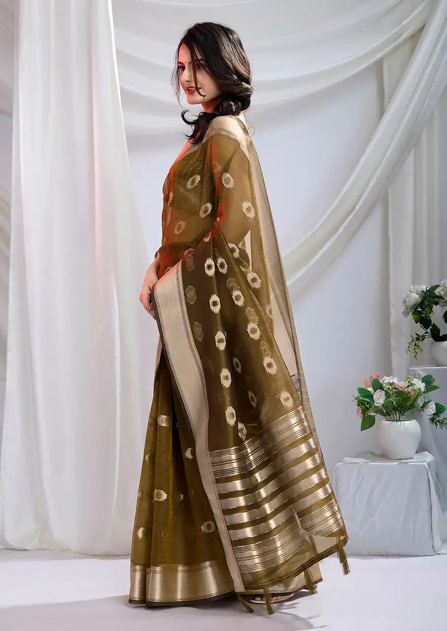 Indo Silk Olive Green Sarees Crafted With A Blend Of Linen And Cotton Offer A Unique Combination Of Texture And Elegance