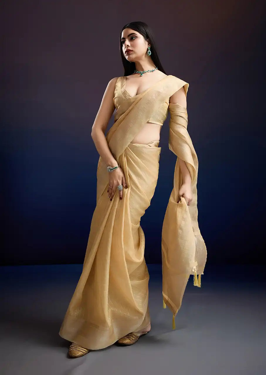 Indo Silk Golden Beige Sarees Crafted With A Blend Of Linen And Cotton Offer A Unique Combination Of Texture And Elegance