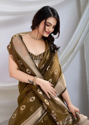 Indo Silk Olive Green Sarees Crafted With A Blend Of Linen And Cotton Offer A Unique Combination Of Texture And Elegance