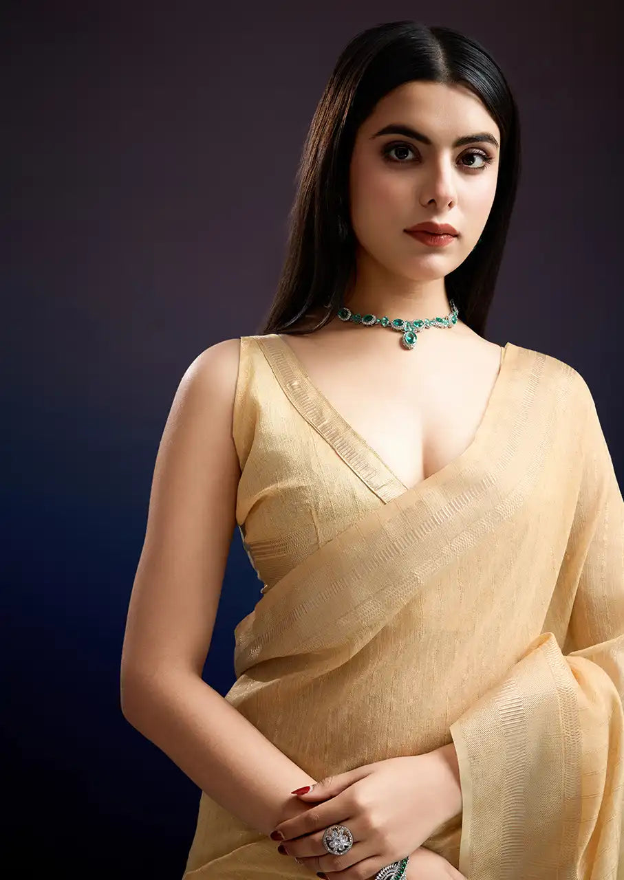 Indo Silk Golden Beige Sarees Crafted With A Blend Of Linen And Cotton Offer A Unique Combination Of Texture And Elegance
