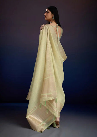 Indo Silk Pastel Yellow Sarees Crafted With A Blend Of Linen And Cotton Offer A Unique Combination Of Texture And Elegance