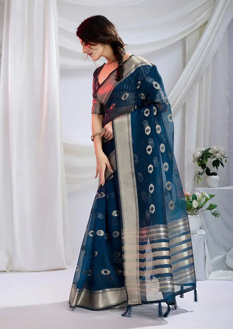 Indo Silk Teal Blue Sarees Crafted With A Blend Of Linen And Cotton Offer A Unique Combination Of Texture And Elegance