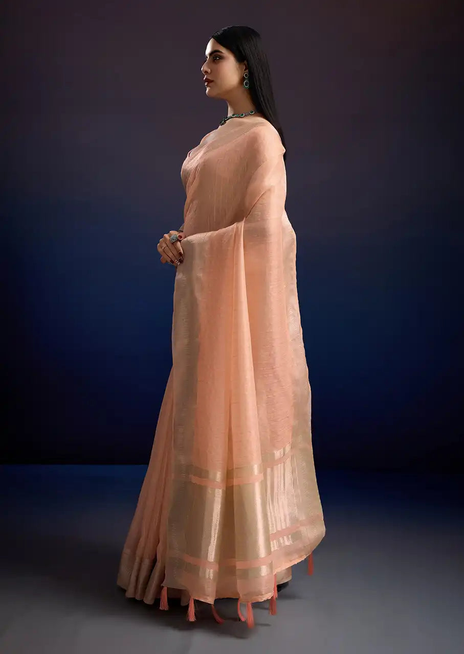 Indo Silk Peach Sarees Crafted With A Blend Of Linen And Cotton Offer A Unique Combination Of Texture And Elegance