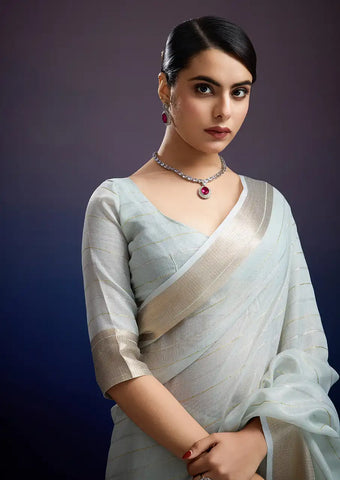 Indo Silk Blue Sarees Crafted With A Blend Of Linen And Silk Offer A Unique Combination Of Texture And Elegance