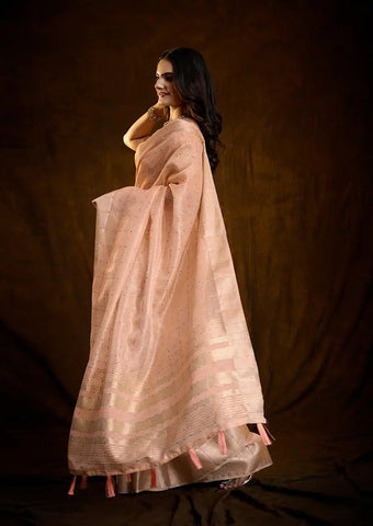 Indo Silk Peach Sarees Crafted With A Blend Of Linen And Silk Offer A Unique Combination Of Texture And Elegance
