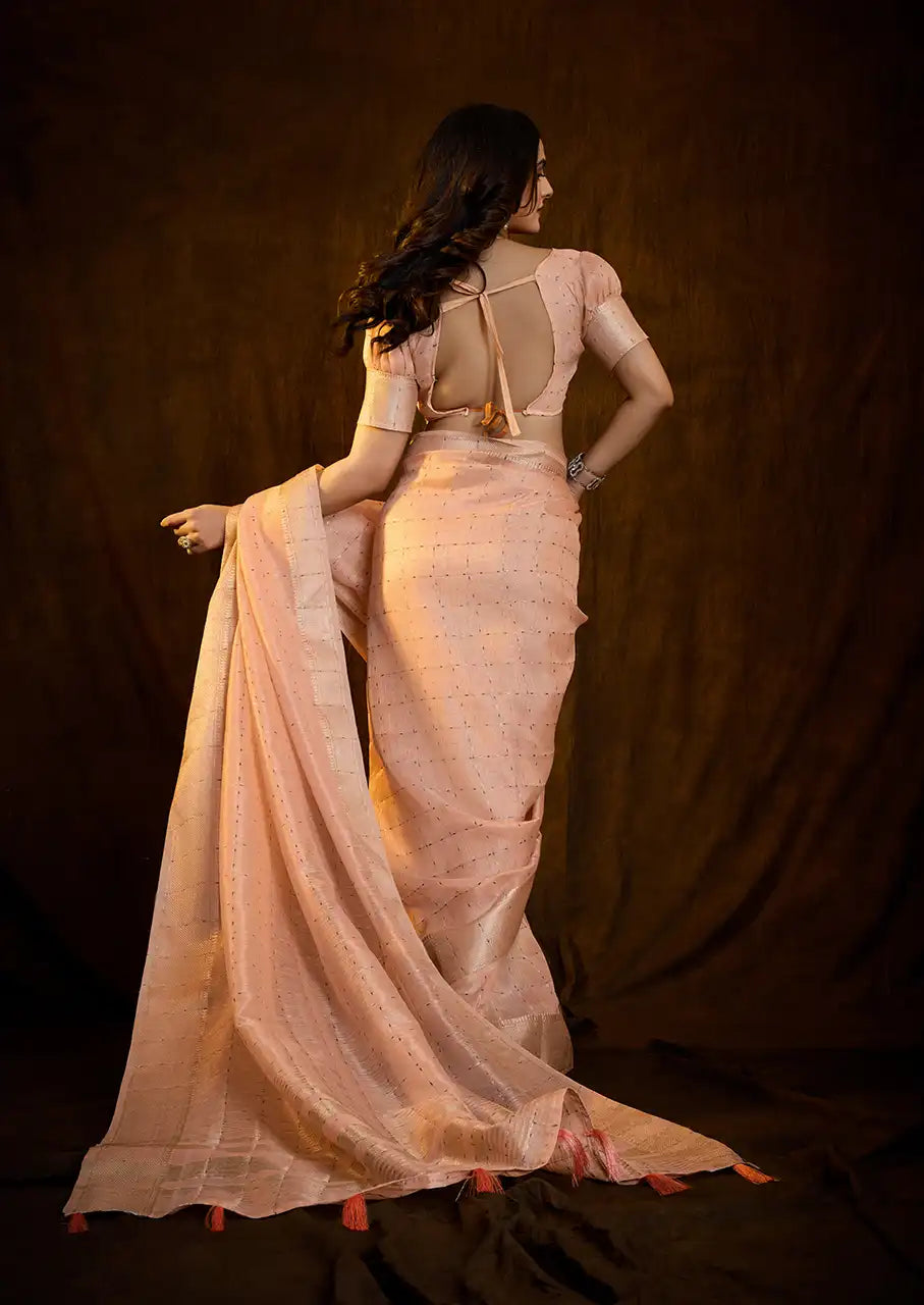 Indo Silk Peach Sarees Crafted With A Blend Of Linen And Silk Offer A Unique Combination Of Texture And Elegance