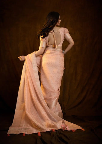 Indo Silk Peach Sarees Crafted With A Blend Of Linen And Silk Offer A Unique Combination Of Texture And Elegance