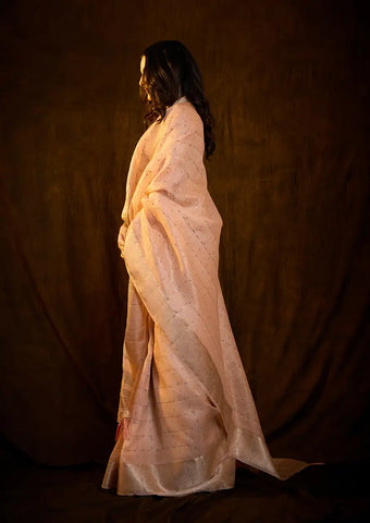 Indo Silk Peach Sarees Crafted With A Blend Of Linen And Silk Offer A Unique Combination Of Texture And Elegance