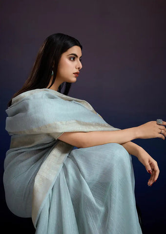 Indo Silk Blue Sarees Crafted With A Blend Of Linen And Cotton Offer A Unique Combination Of Texture And Elegance