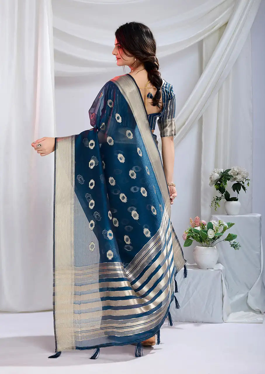 Indo Silk Teal Blue Sarees Crafted With A Blend Of Linen And Cotton Offer A Unique Combination Of Texture And Elegance