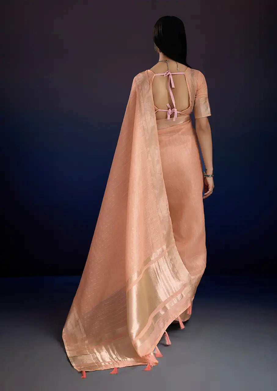 Indo Silk Peach Sarees Crafted With A Blend Of Linen And Cotton Offer A Unique Combination Of Texture And Elegance