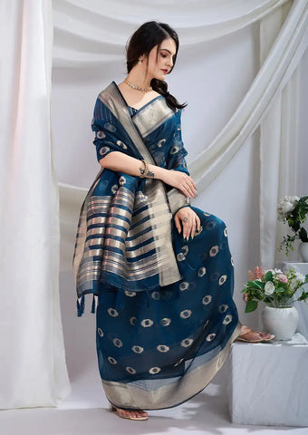 Indo Silk Teal Blue Sarees Crafted With A Blend Of Linen And Cotton Offer A Unique Combination Of Texture And Elegance