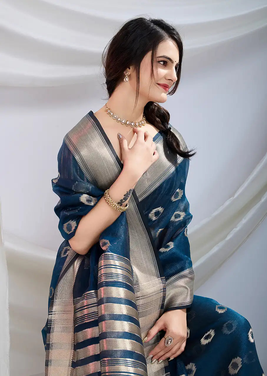 Indo Silk Teal Blue Sarees Crafted With A Blend Of Linen And Cotton Offer A Unique Combination Of Texture And Elegance