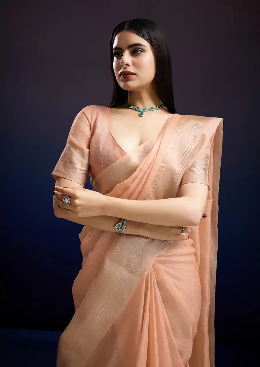 Indo Silk Peach Sarees Crafted With A Blend Of Linen And Cotton Offer A Unique Combination Of Texture And Elegance