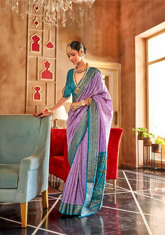 Purple color classical patola sambal puri print with aqua finish saree