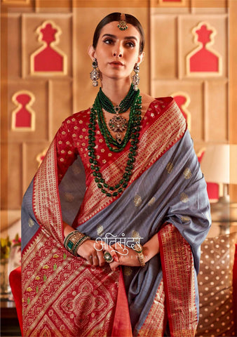 Grey color classical patola sambal puri print with aqua finish saree