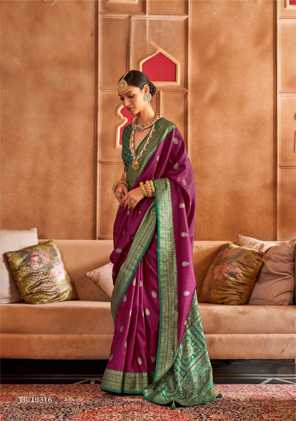 Magenta pink color classical patola sambal puri print with aqua finish saree