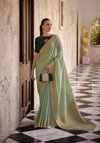 Green linen saree with golden Zari Border