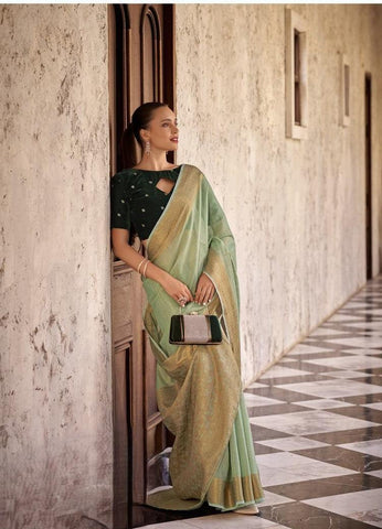 Green linen saree with golden Zari Border