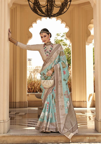 Turquoise color designer raw silk saree