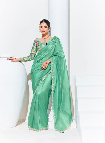 Emerald green color organza saree